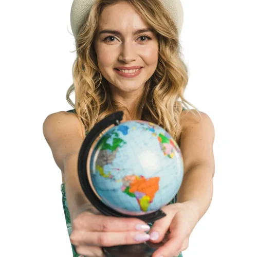smiling-attractive-young-woman-hat-dress-showing-globe-1-scaled-e1748256958577-Photoroom smiling-attractive-young-woman-hat-dress-showing-globe-1-scaled-e1748256958577-Photoroom